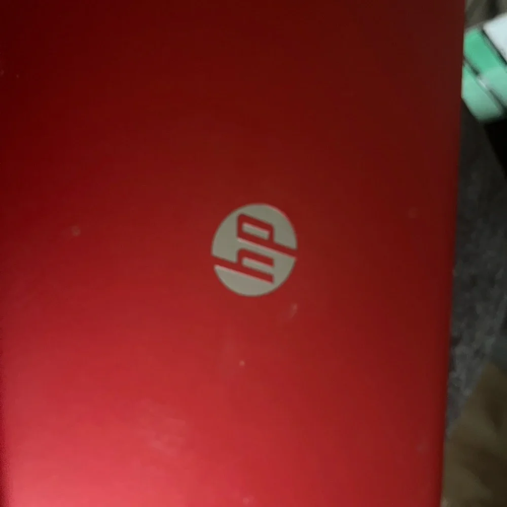 HP Silver Laptop with Red Accents